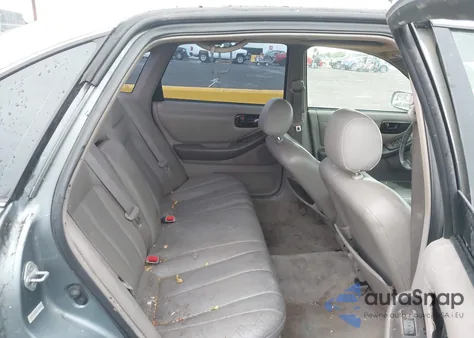 1999 Toyota Avalon Xls z USA, uszkodzony, nr VIN 4T1BF18B9XU299912